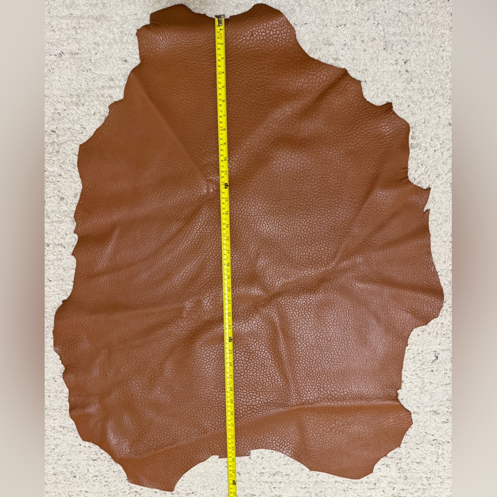 Tan Firm Embossed Leather Hide brown color